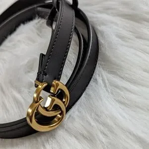 Beautiful Faux leather GG black and gold belt. NWOT. In perfect condition. Authentic Gucci Black Signature Leather with Gold GG Buckle  main image 3